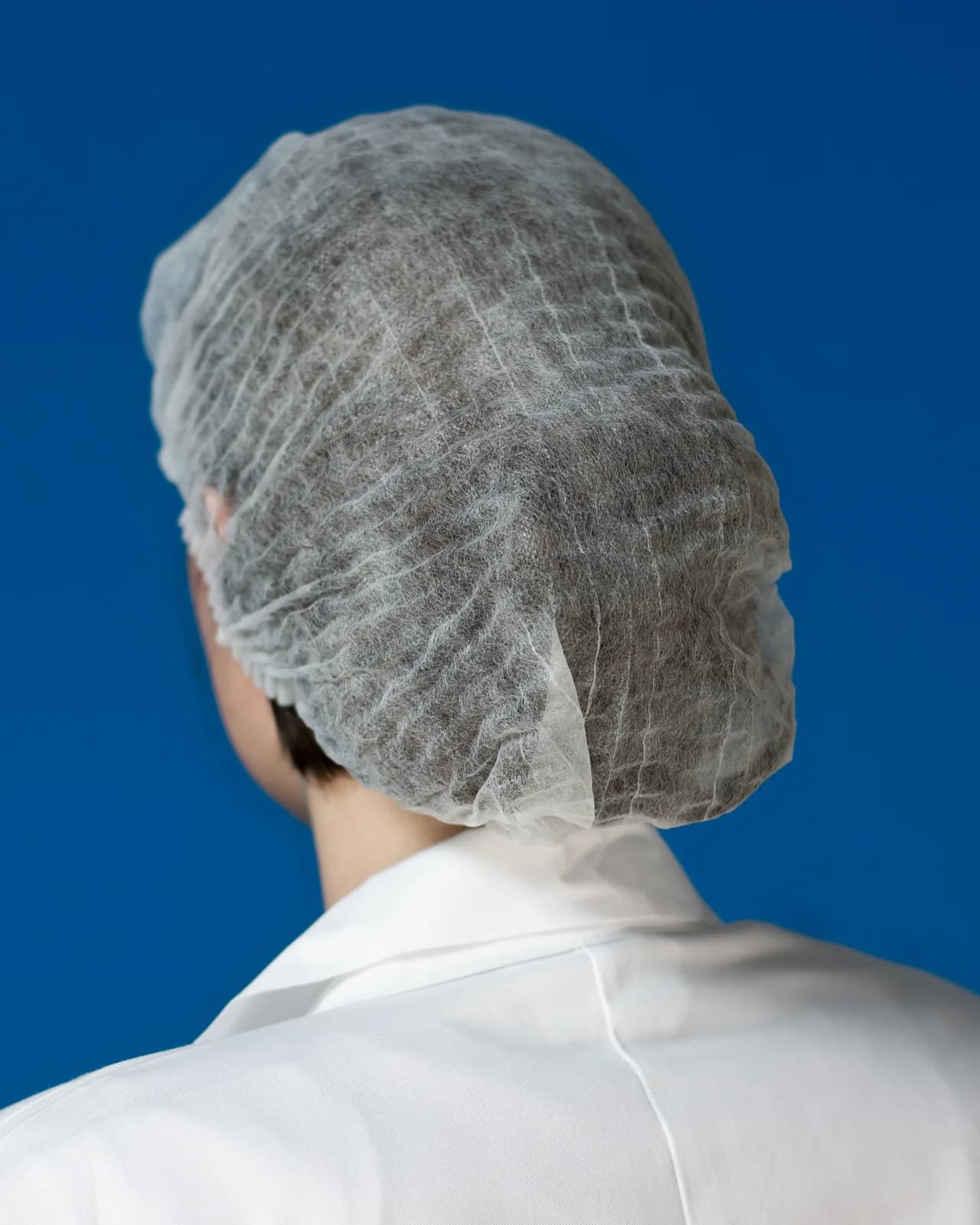 Compostable Hairnet & Bouffant Cap — Soft non-woven bouffant cap in bio-resin fabric, latex free, one size